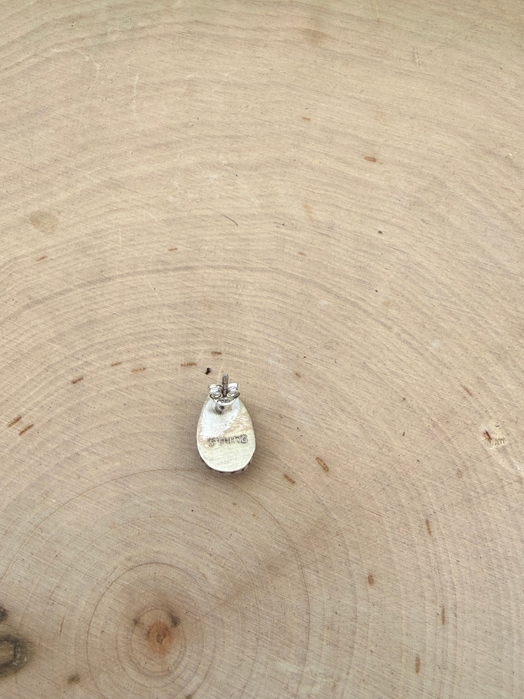 Pink conch stud earrings