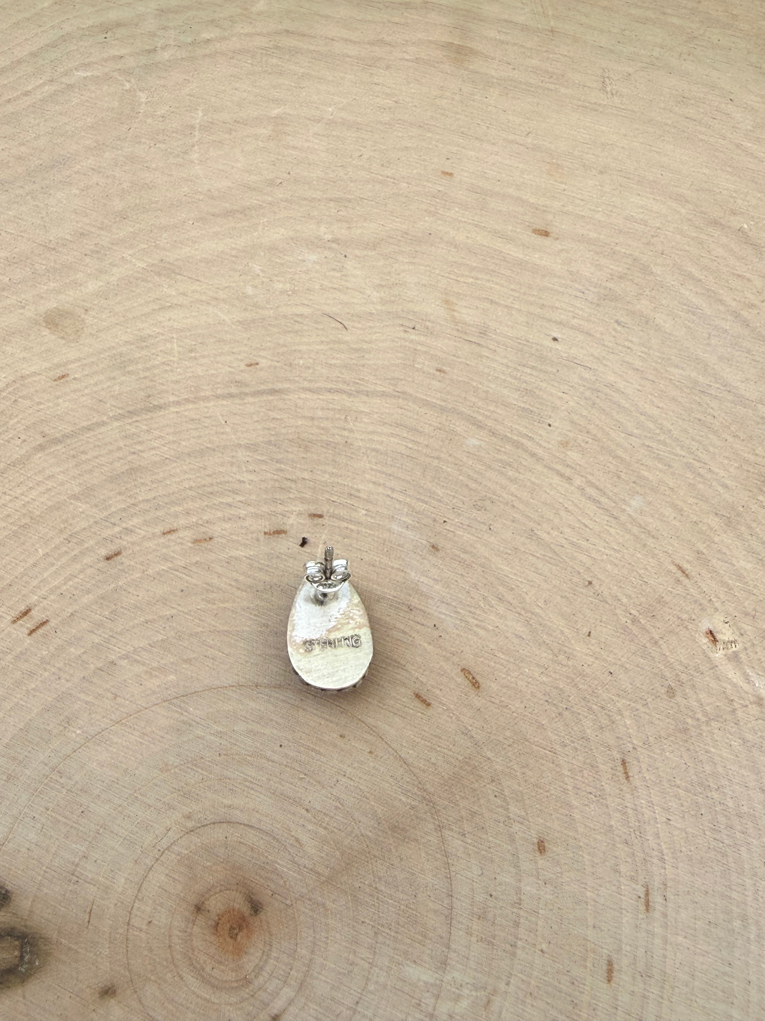 Pink conch stud earrings