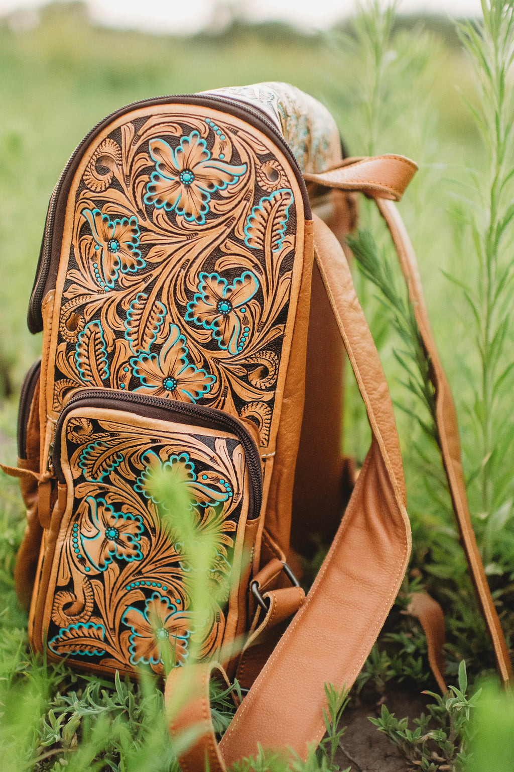 Turquoise flower leather backpack