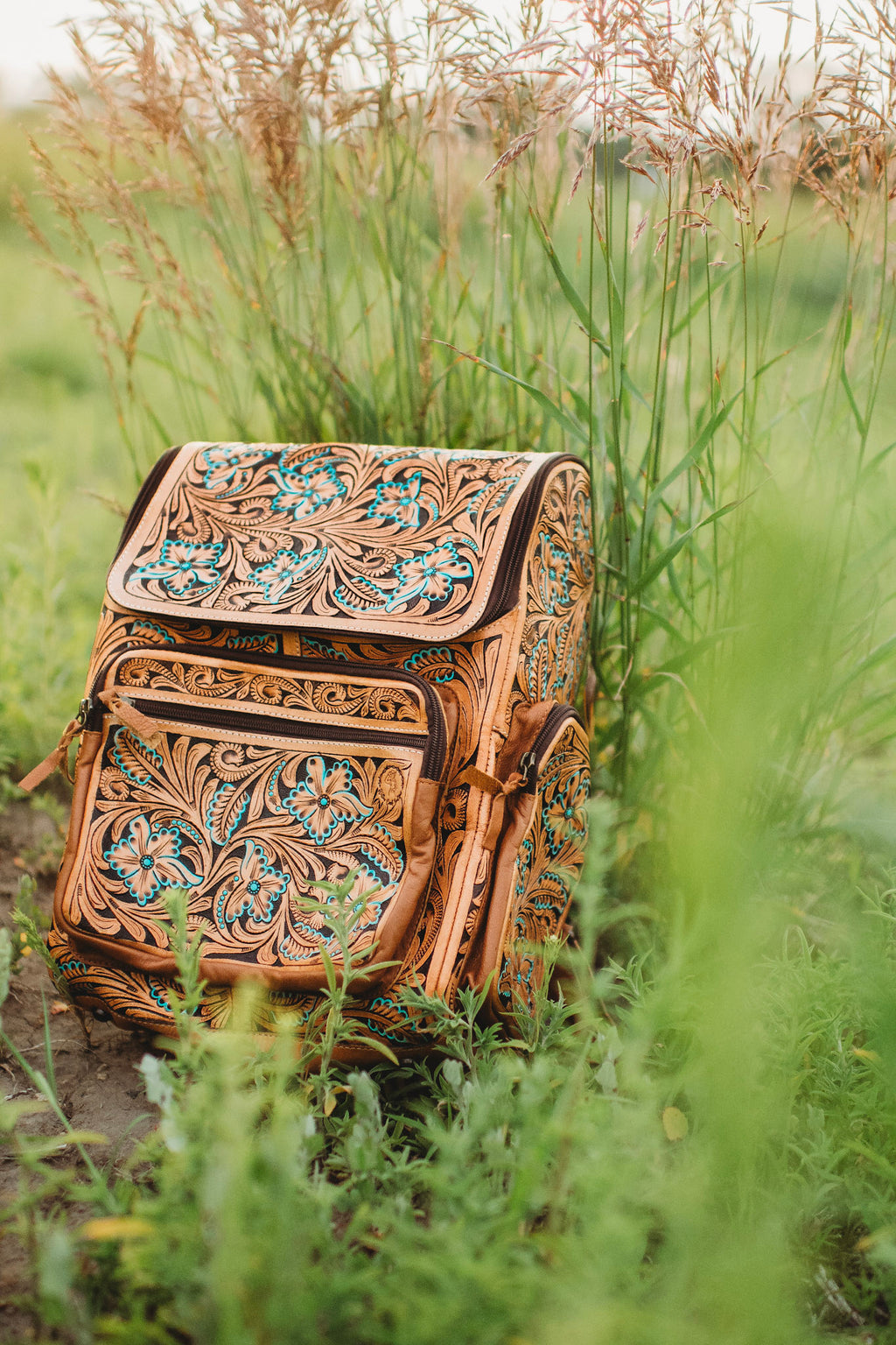 Turquoise flower leather backpack