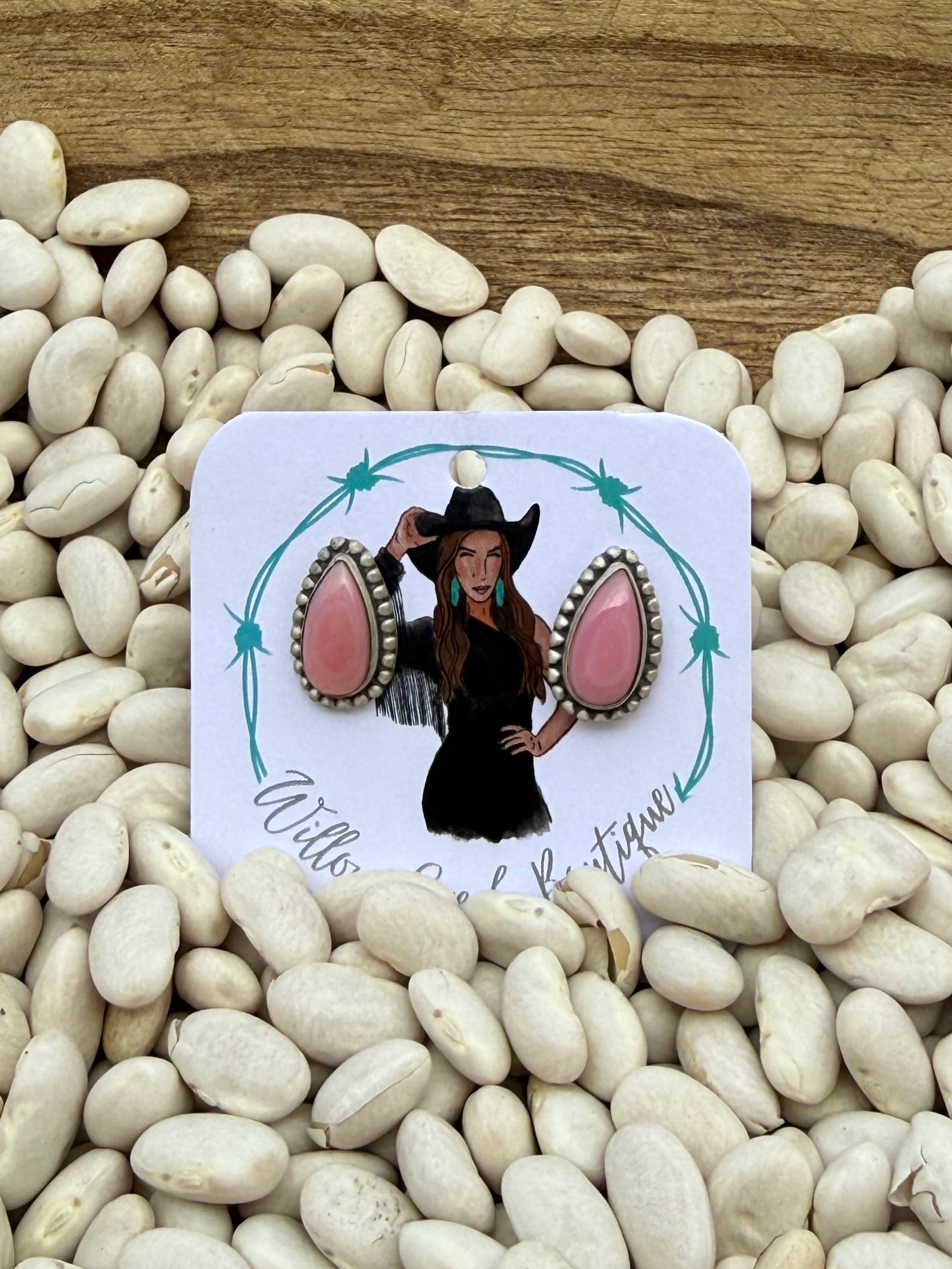 Pink conch stud earrings