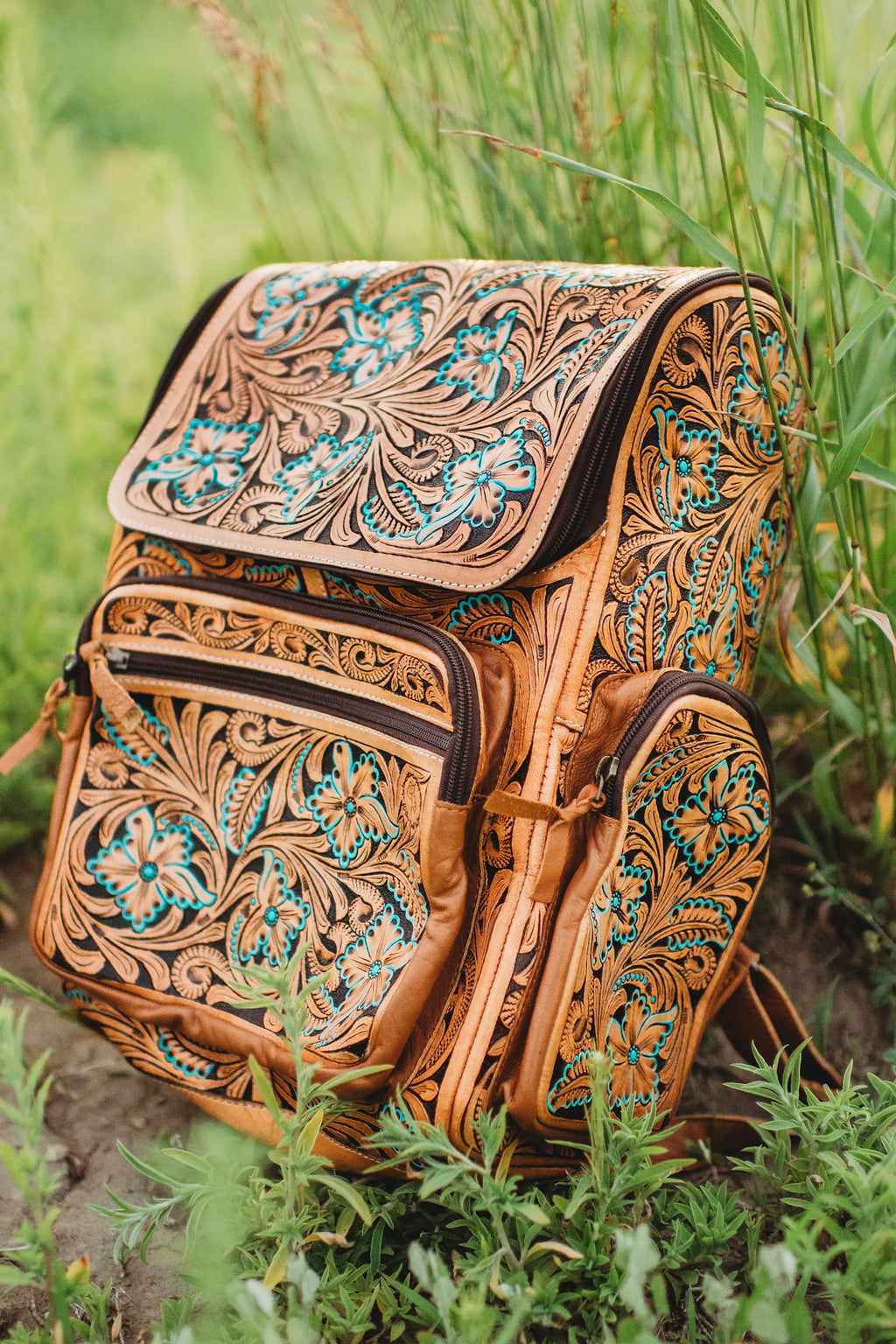 Turquoise flower leather backpack