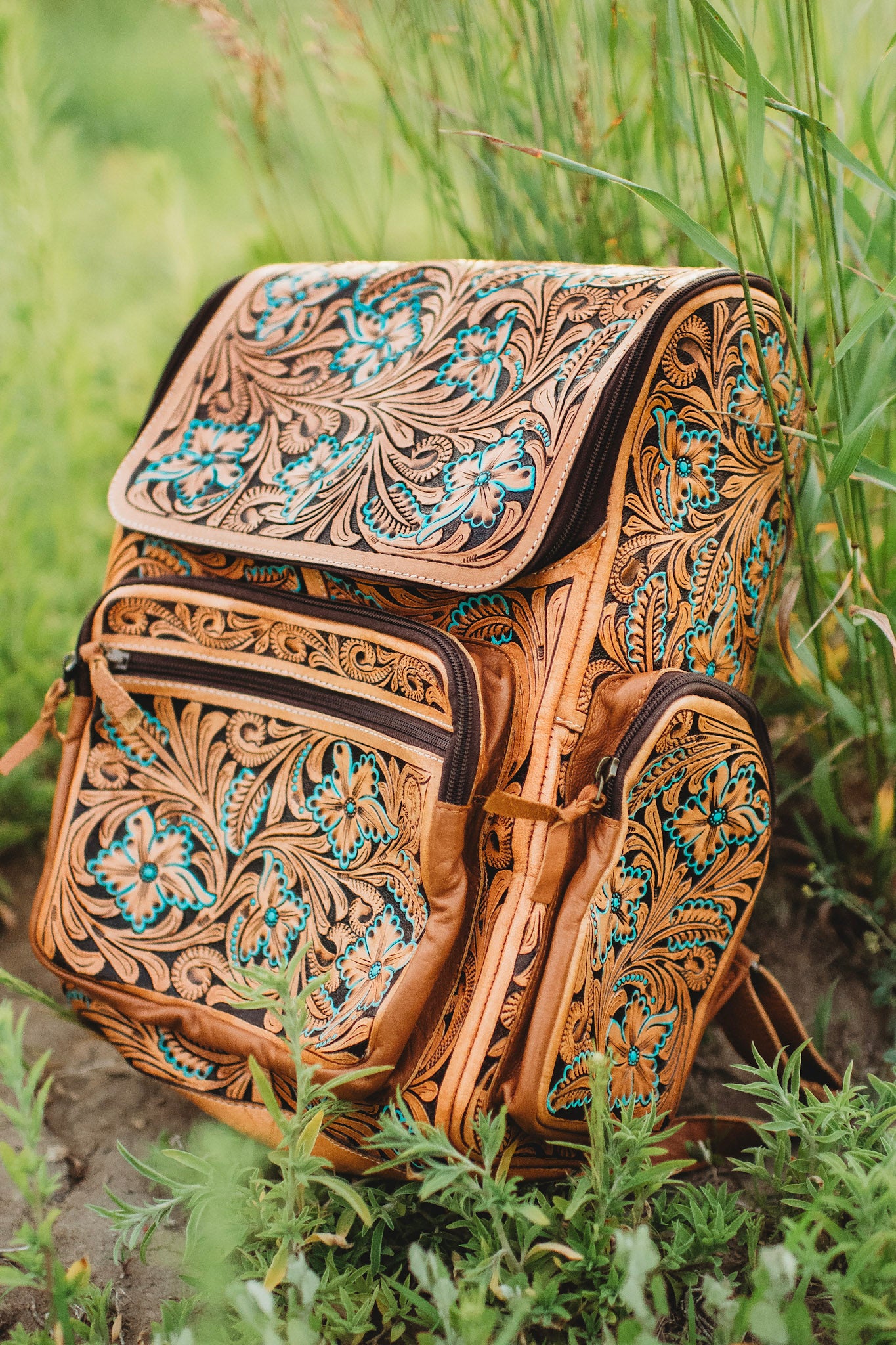 Turquoise flower leather backpack