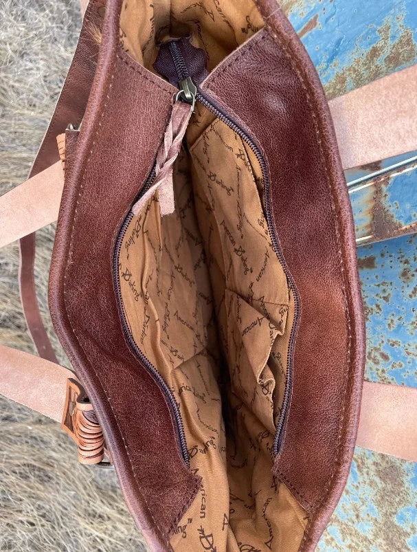 Cowhide concho purse
