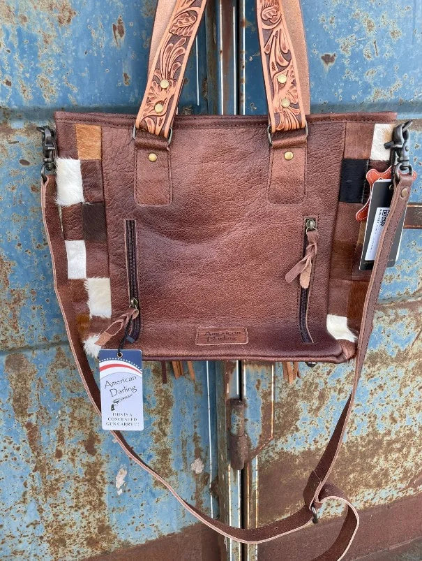 Cowhide concho purse