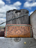 Turquoise trim tooled leather wallet