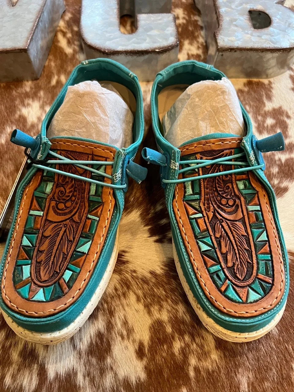 Tooled feather turquoise leather shoes